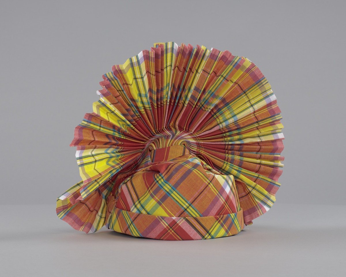 Guadeloupean Madras headdress created by DODY Handkerchief woven in Chennai, tied in Pointe-à-Pitre, 2015 Collection of the Smithsonian National Museum of  African American History and Culture, 2015.153
